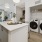 In-unit washer and dryer with built in shelving