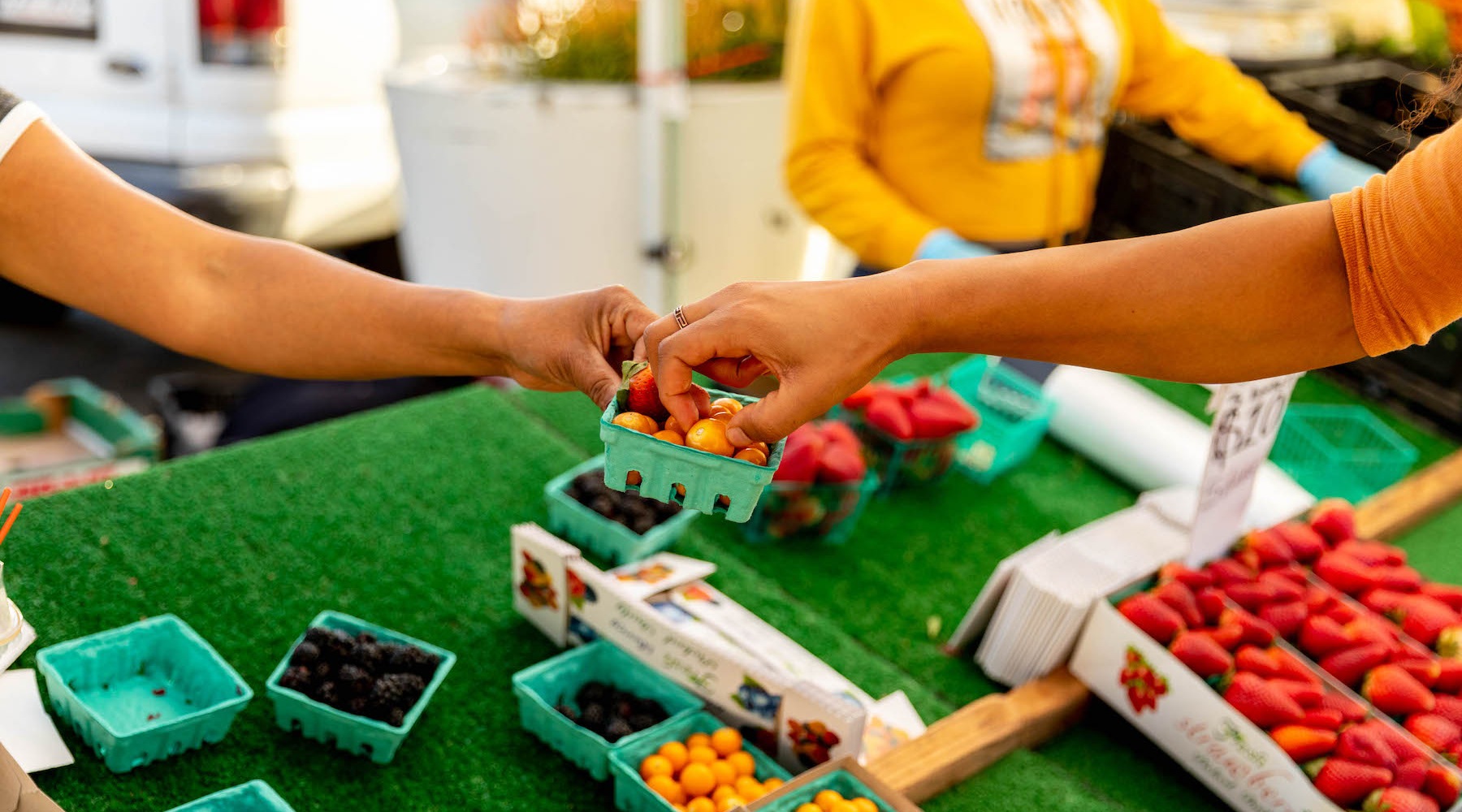 sprouts farmers market lifestyle image of people at a farmers market